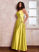 Maxi Robe en Satin à Bretelles Spaghetti avec Poches Souci