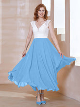 Robe en Mousseline Longueur de Mollet à Col en V avec Poches Bleu