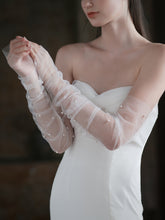 Les gants de mariée en perles blanches