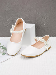 Chaussures en cuir à semelle souple blanches avec boucle perle