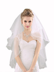 Voile de mariée à piping