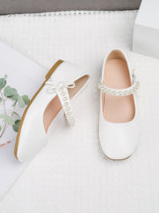 Chaussures en cuir à semelle souple blanches avec boucle perle