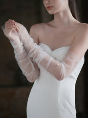Les gants de mariée en perles blanches