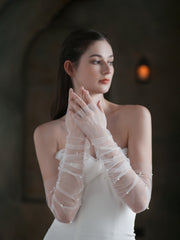 Les gants de mariée en perles blanches