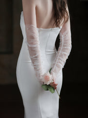 Les gants de mariée en perles blanches