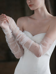 Les gants de mariée en perles blanches